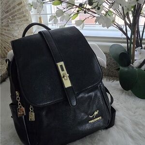 Elegant Black Leather Backpack with Gold Accents